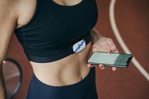 Woman pairing a Wahoo Tickr HRM with her phone